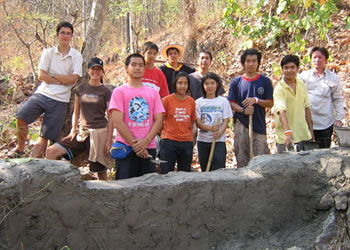 Halfway through construction. �iYouth working group for check dam.�j